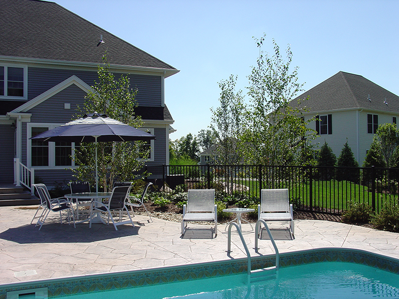 Swimming pool and stamped concrete project example 128